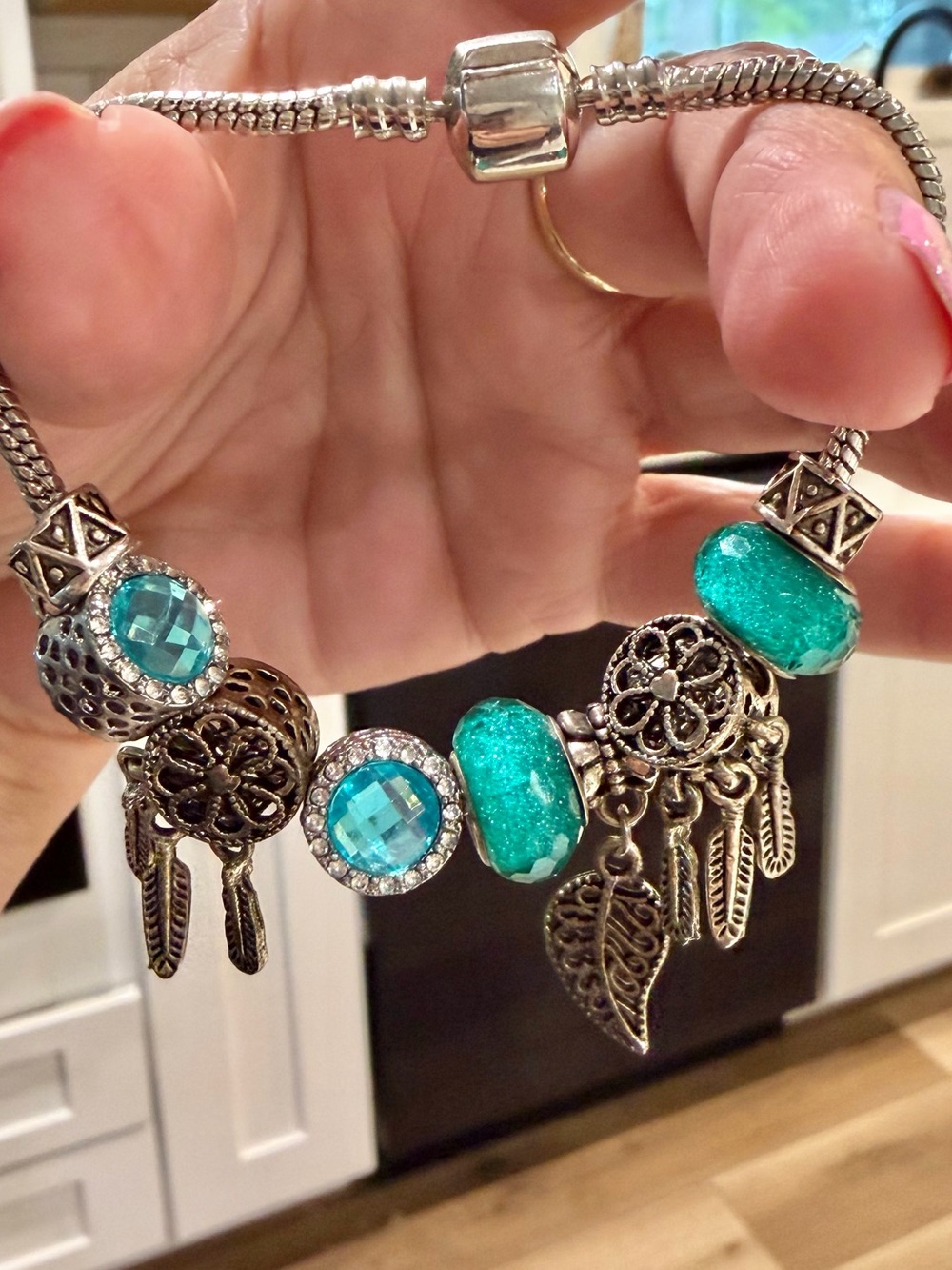 Silver charm bracelet with removable turquoise glass beads & Charms